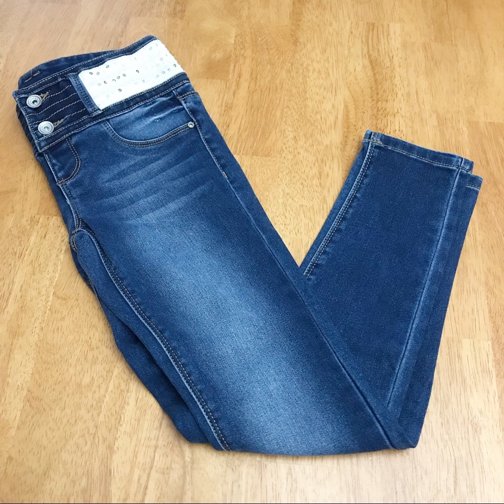 Girls size 10 dark washed jeans with belt design